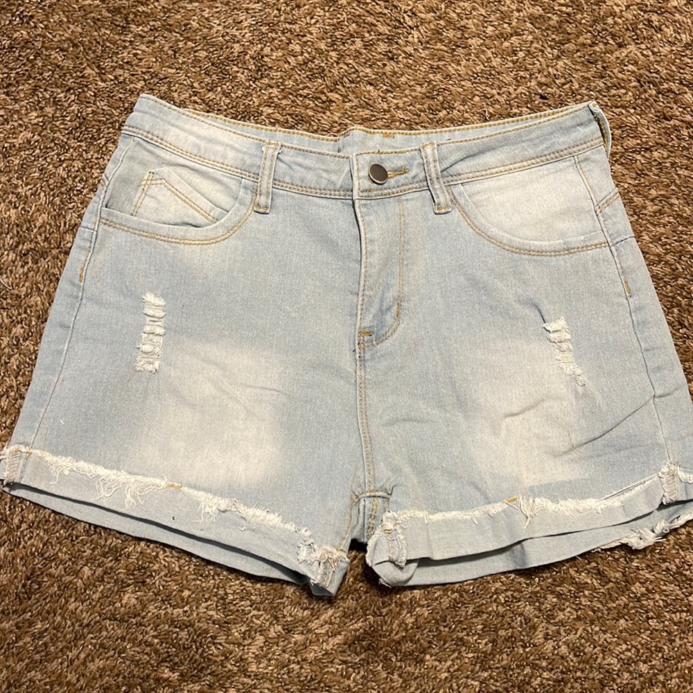 Shein distressed light denim shorts. Size medium. NEVER WORN!